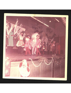 Photograph of numerous student performers during a Christmas show