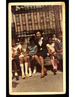 Photograph of Dolares WIlliams and five students