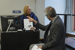 Photograph of Karen Taylor (l) and Dan Perlstein (r) at Modern School multigenerational reunion