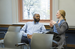 Photograph of Teachers College students Alton McCall and Amanda Deering at Modern School multigenerational reunion 