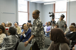 Photograph of Daryl Sherman speaking at Modern School multigenerational reunion