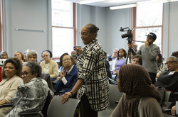 Photograph of Daryl Sherman speaking at Modern School multigenerational reunion